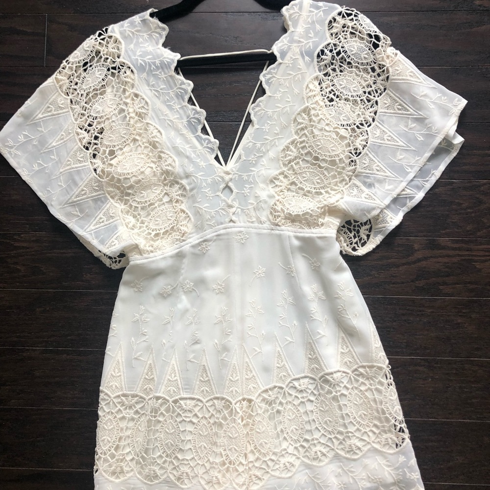 ASTR cream lace embroidered romper. Size Small